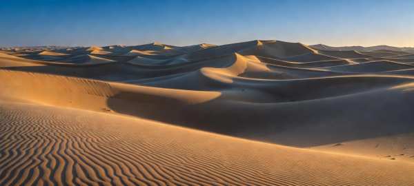 Desert Waves Under Blue Sky — desktop wallpaper