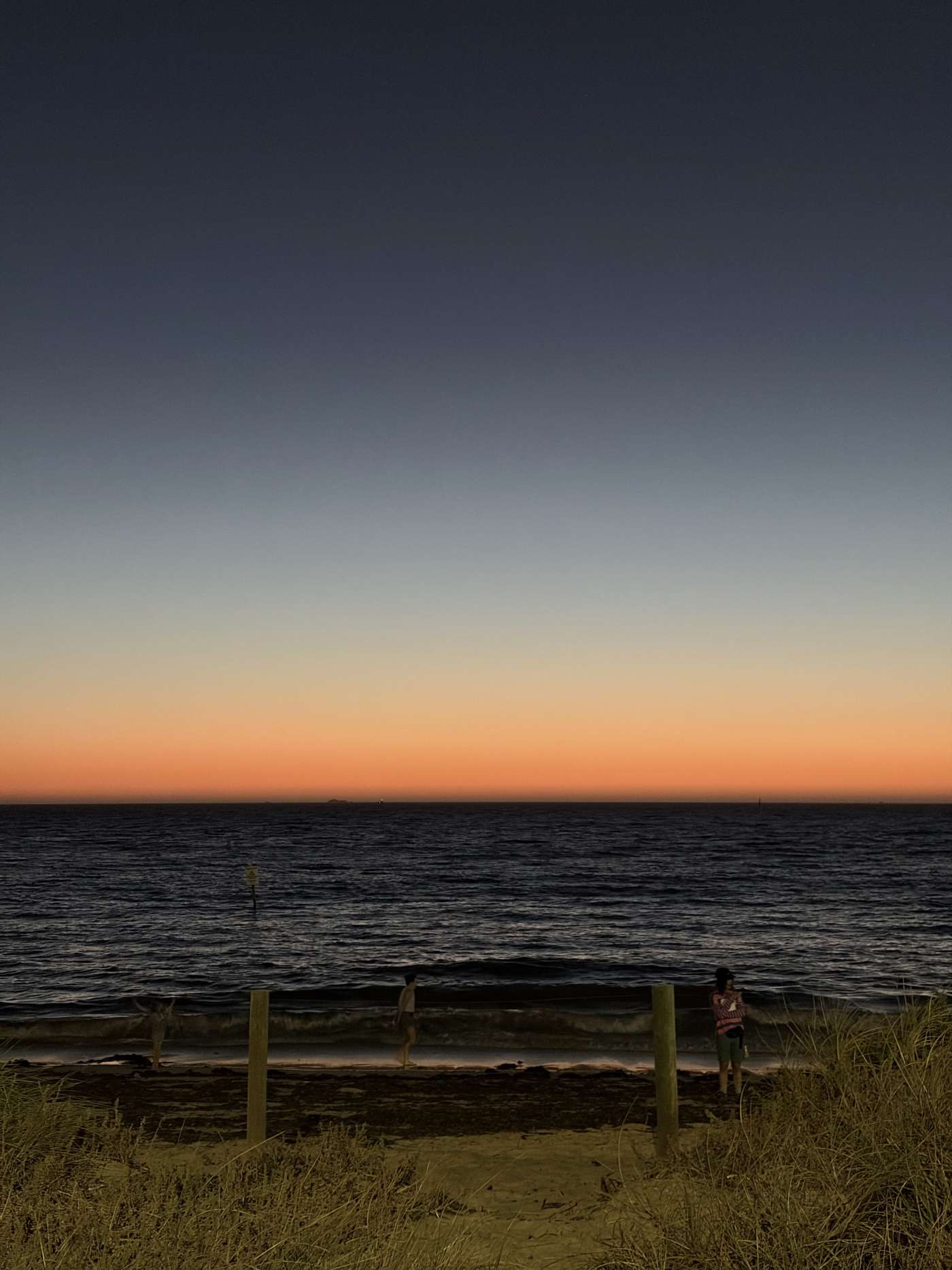 Serene Ocean Sunset Glow — phone wallpaper preview