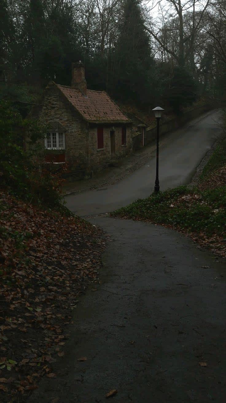 Secluded Stone Cottage Winding Path — phone wallpaper preview