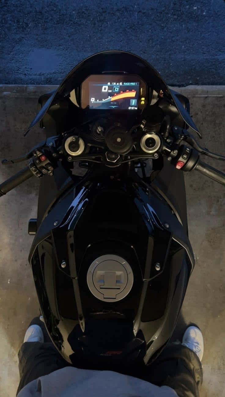Sleek Black Sportbike Digital Display — phone wallpaper preview