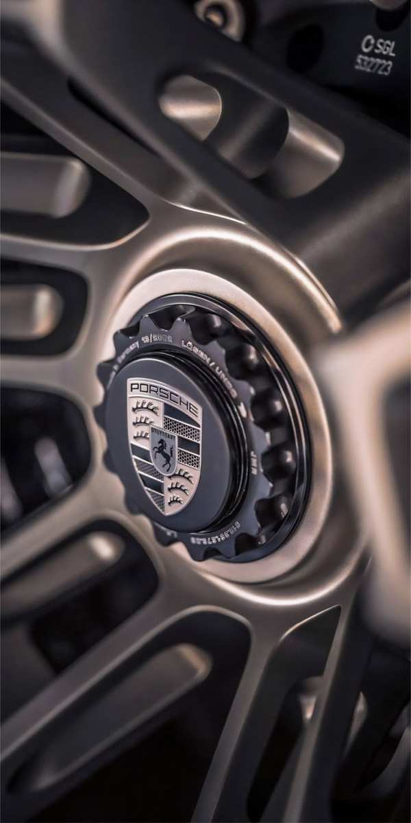 Sleek Porsche Wheel Emblem — phone wallpaper