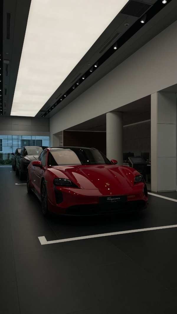 Sleek Red Electric Porsche Taycan — phone wallpaper