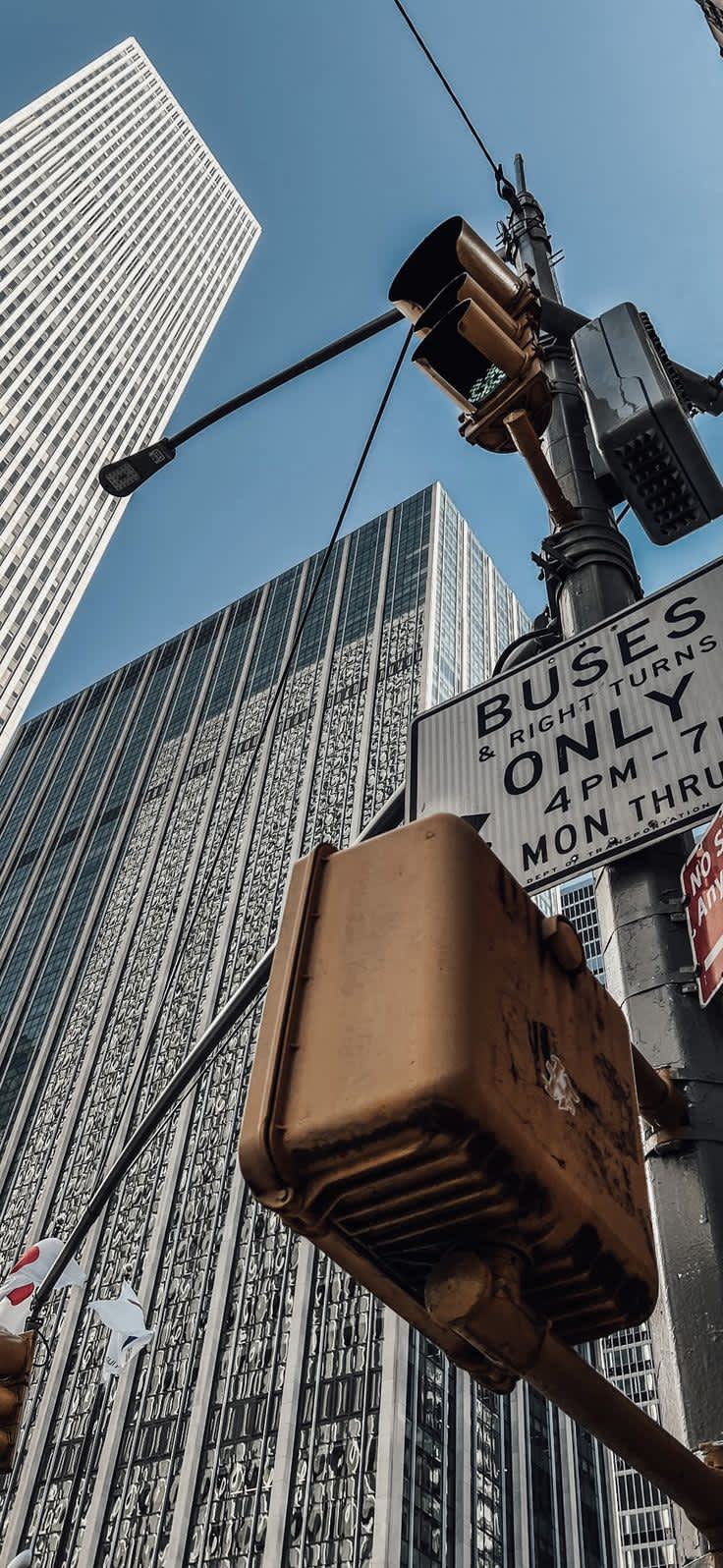 Urban Skyscrapers and Traffic Lights — phone wallpaper preview