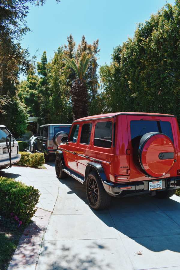 Vibrant Red G-Wagen Luxury Driveway — phone wallpaper