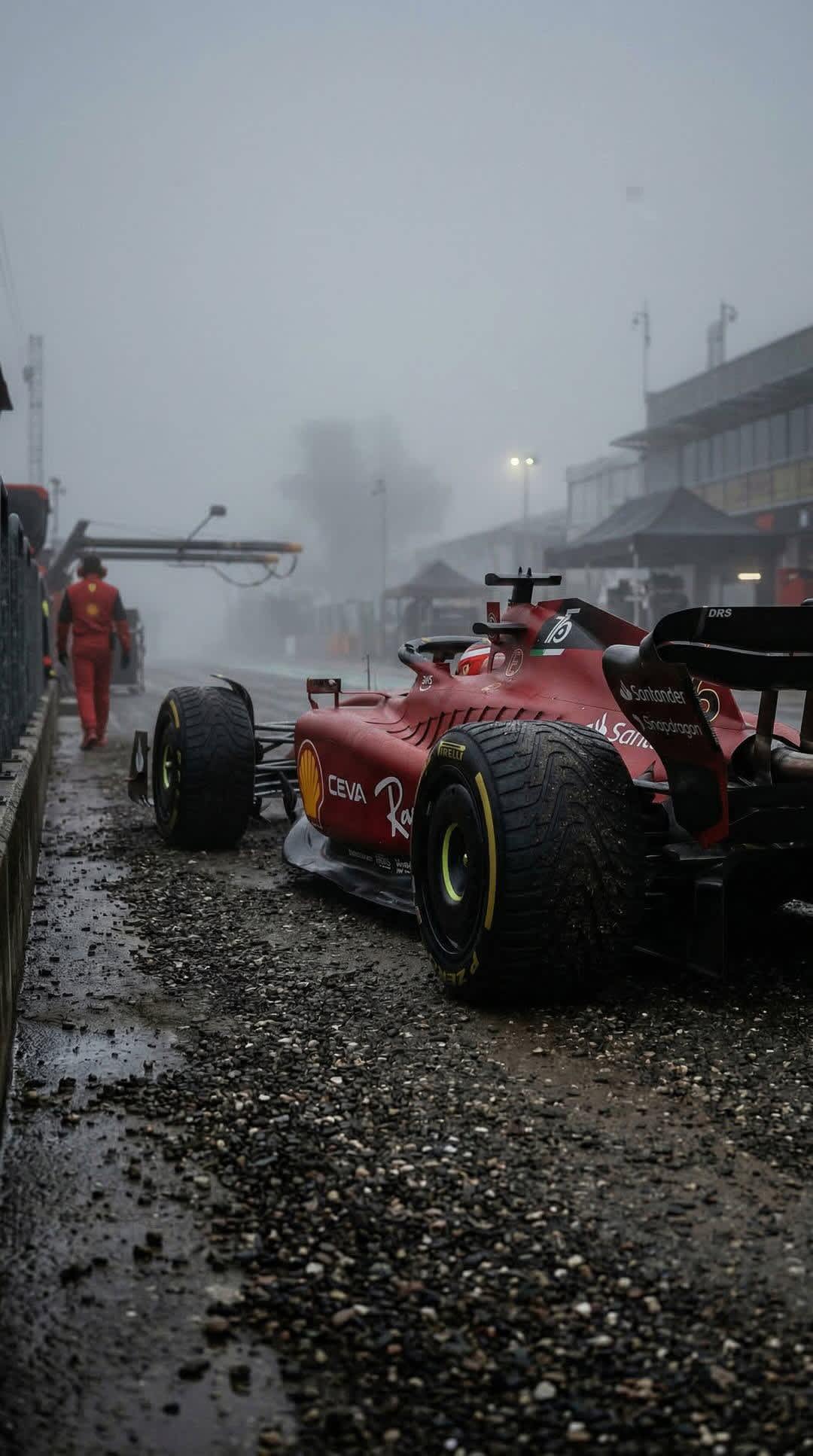 Ferrari F1 Car Misty Pit Lane — phone wallpaper preview