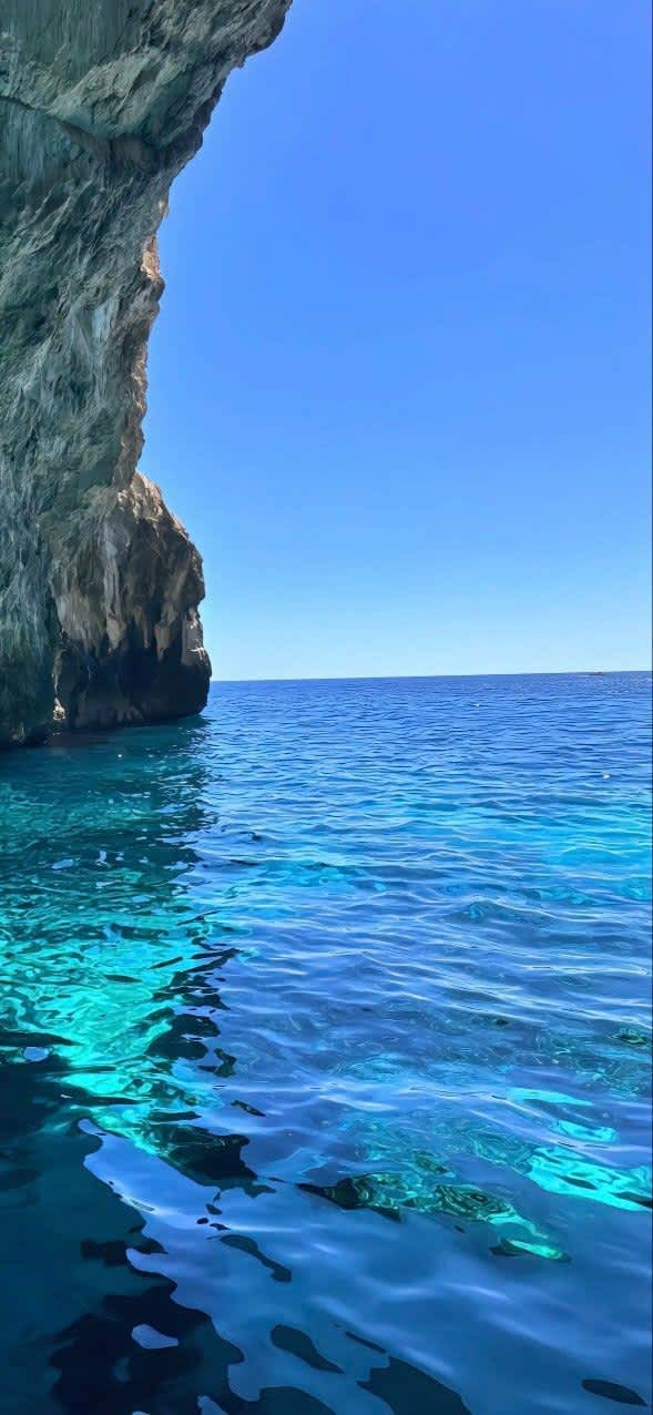 Crystal Blue Grotto Waters — phone wallpaper preview