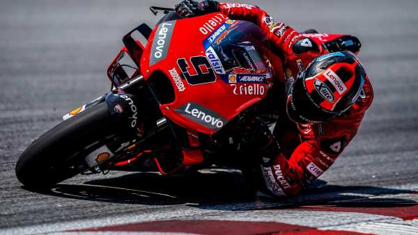 Red Ducati MotoGP Racer Cornering — desktop wallpaper