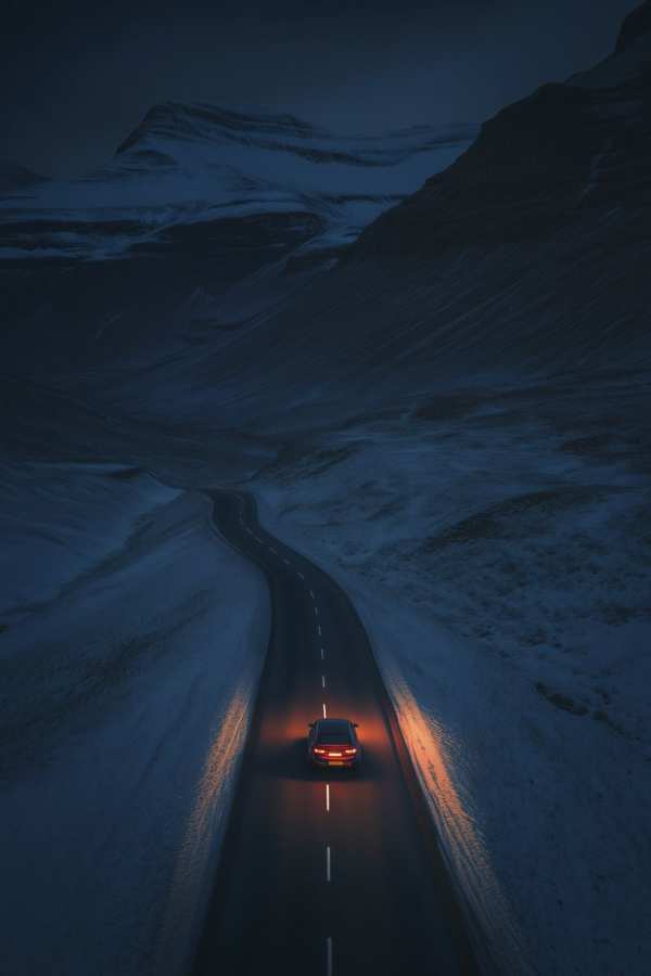 Midnight Journey Through Winter Peaks — phone wallpaper