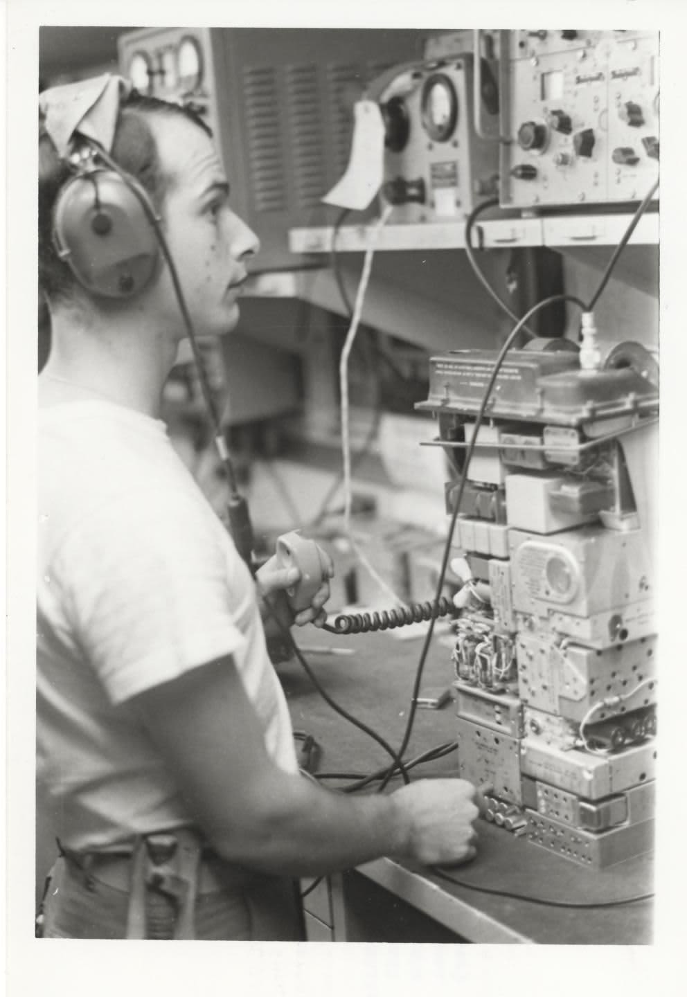 MNARA technician servicing and calibrating an industrial barcode printer