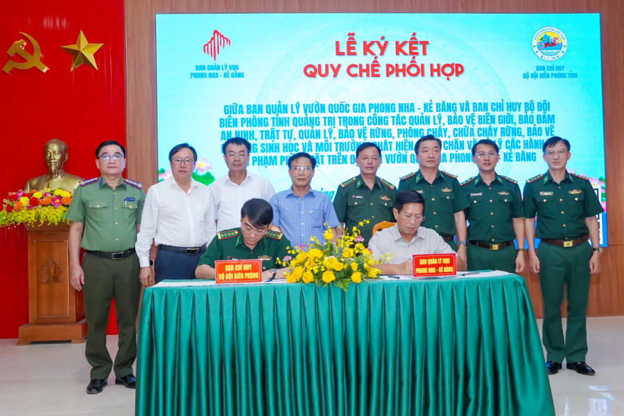 Ban Quản lý VQG PN-KB ký kết quy chế phối hợp với Ban Chỉ huy Bộ đội Biên phòng tỉnh - Ảnh: N.H