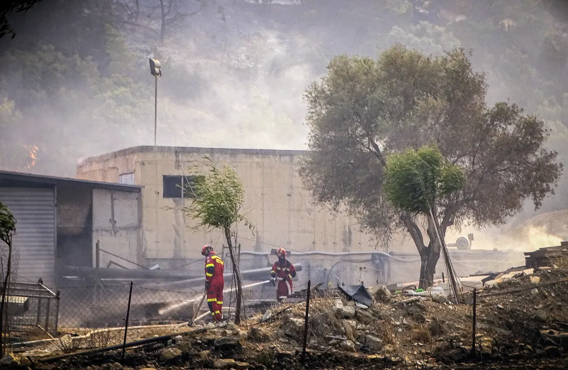 The wildfire has been raging on the Greek island of Rhodes for five days, forcing hundreds of people to flee affected villages.