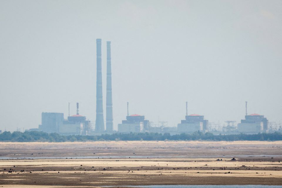 A view shows Zaporizhzhia Nuclear Power Plant from the bank of Kakhovka Reservoir near the town of Nikopol after the Nova Kakhovka dam breach in the Dnipropetrovsk region, Ukraine, June 16, 2023.