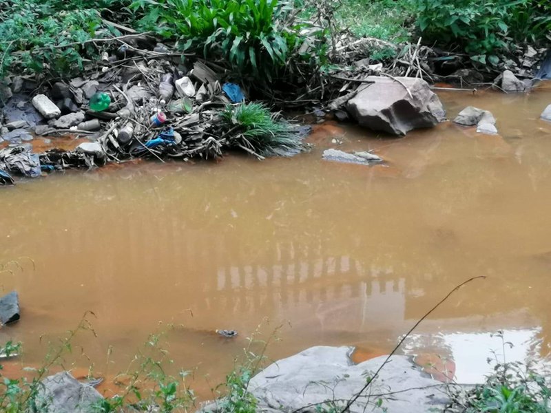 Polluted water in the UmBilo river system in Durban’s eThekwini municipality