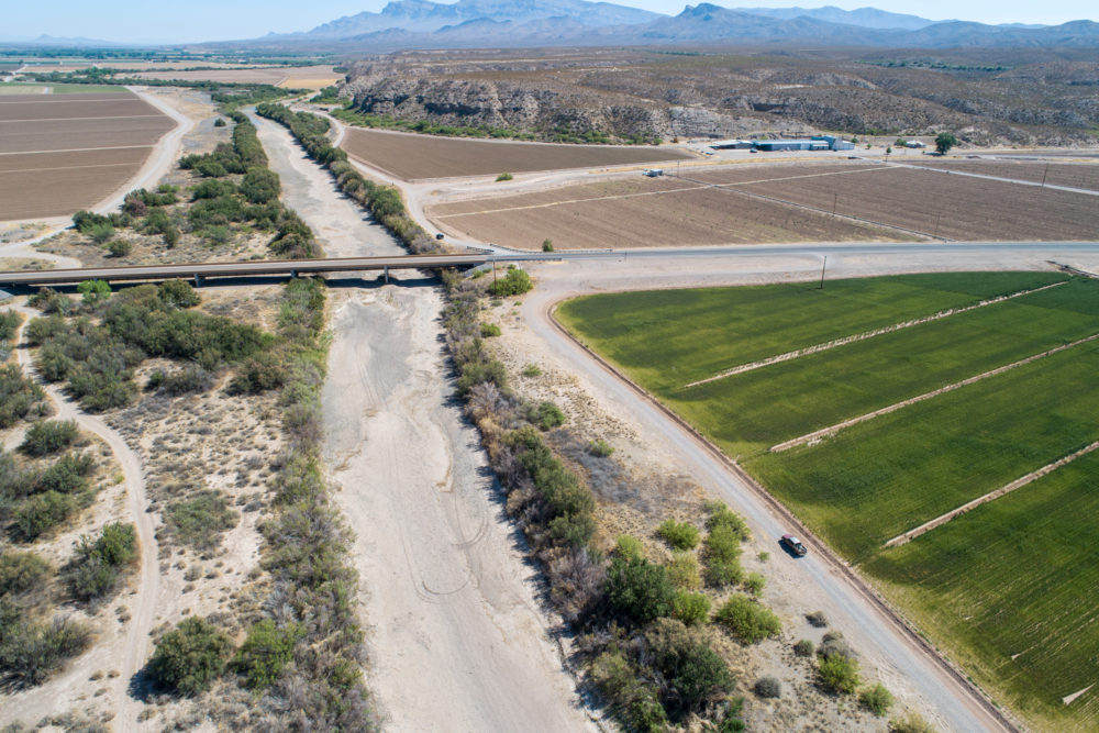 South of Elephant Butte Dam in New Mexico, the Rio Grande is dry for most of the year, and farmers pump groundwater for their fields.