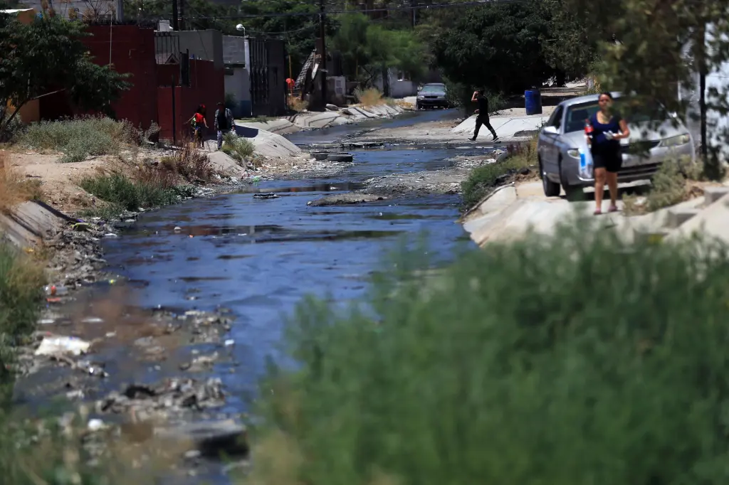 A channel contaminated with sewage flowing into the Rio Grande in Ciudad Juarez, Mexico, on July 31, 2023.