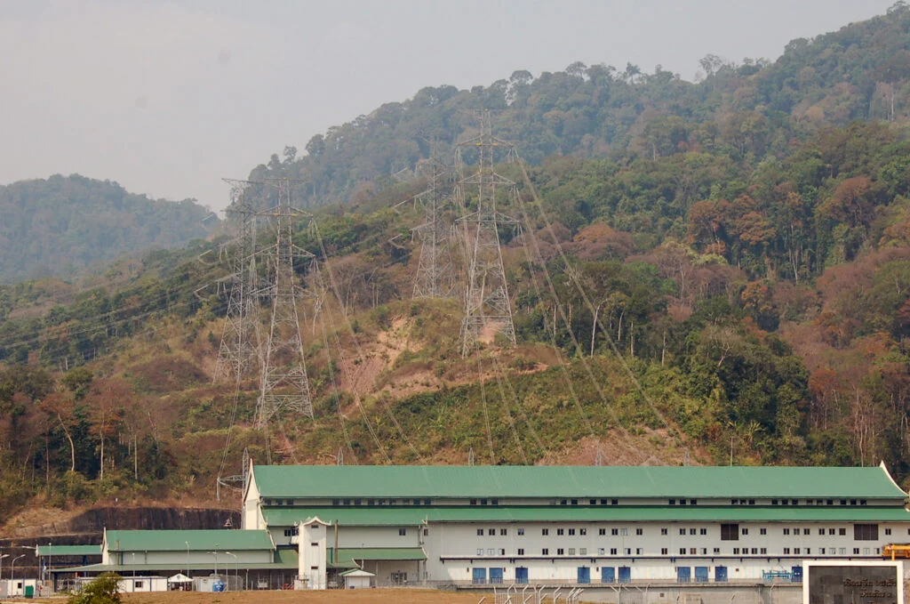 Power lines were built and cut through the forest in Khammouane province in central Laos. As Laos develops, more forested areas are being used for infrastructure development that aims to improve people's connectivity and access to basic needs such as energy.