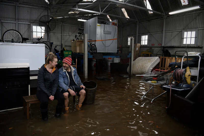 Camden residents Les Hallack and Haley Lines, who in six months have endured four flooding incidents, this particular episode being the worst.