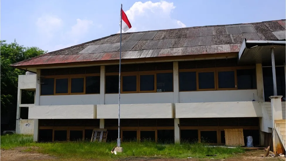 The ground floor of this abandoned office building is now underground
