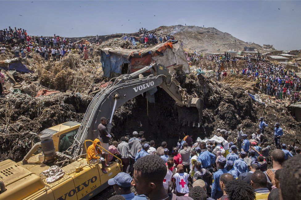 Rescuers are using bulldozers and even bare hands to move tonnes of debris