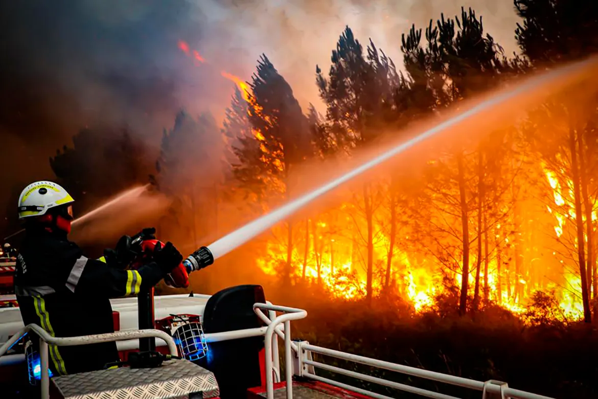 Several hundred firefighters struggled to contain two wildfires in the Bordeaux region of southwest France