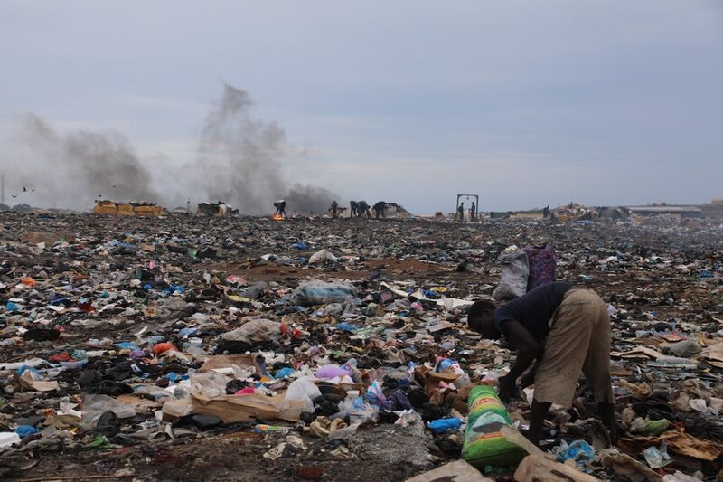 Workers pick through waste at Agbogbloshie