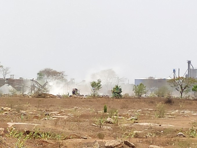Of Dust in air of the surrounding areas of cement factories