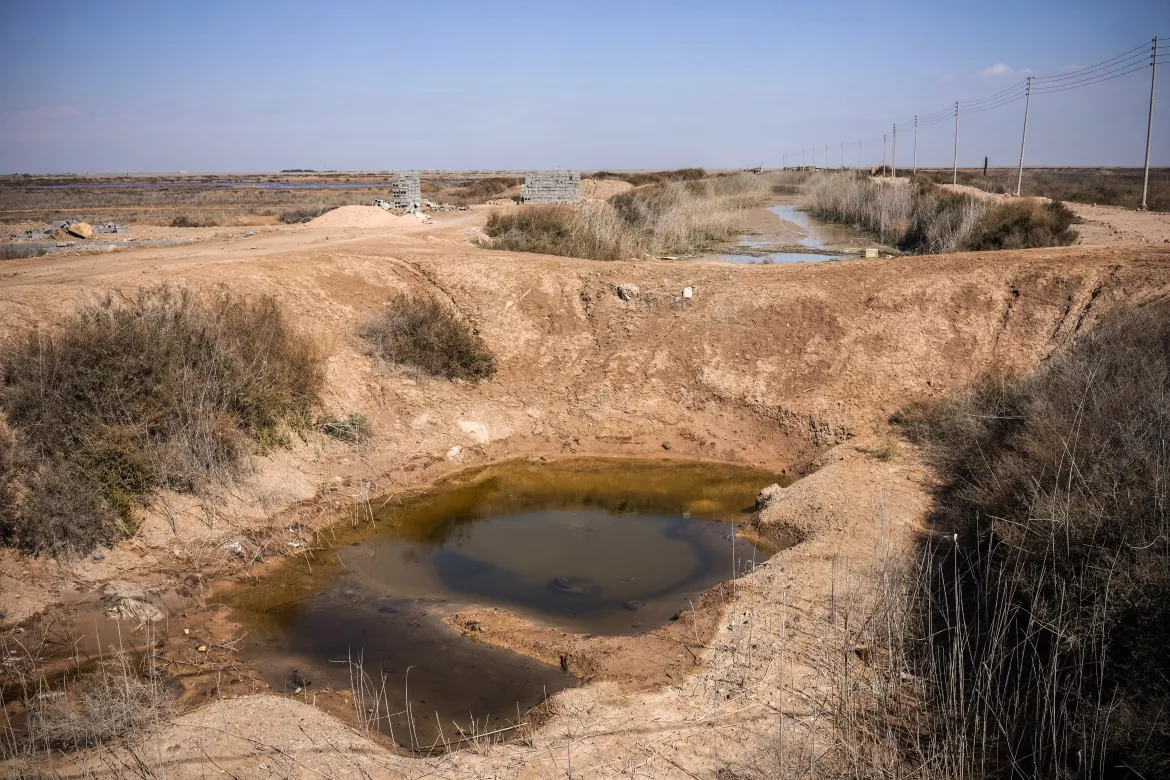 A dried-up artificial irrigation lake in the village of Ras al-Bisha in southern Iraq.