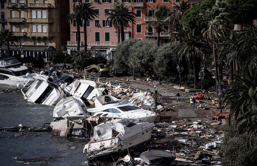 Destroyed yachts and boats lie in the harbour of Rapallo, near Genoa