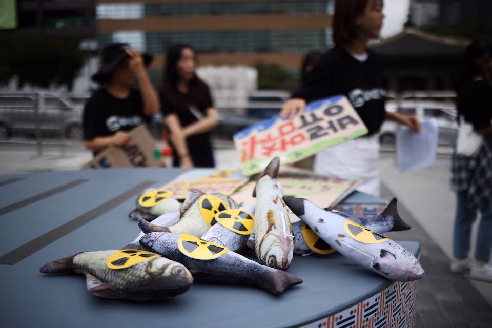 Activists attend a protest at the National Assembly in Seoul, South Korea, August 24, 2023.