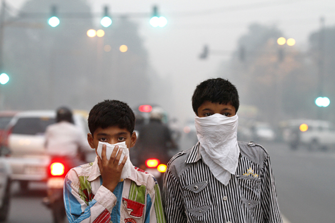 People wear masks due to air pollution in downtown Mexico City.