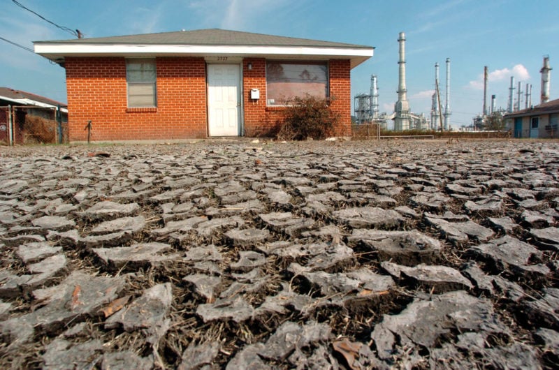 The aftermath in St. Bernard Parish of the Murphy Oil spill following Katrina. A mix of oil, mud and unknown substances covers the land. (Chris Granger/The Times-Picayune and The Advocate)