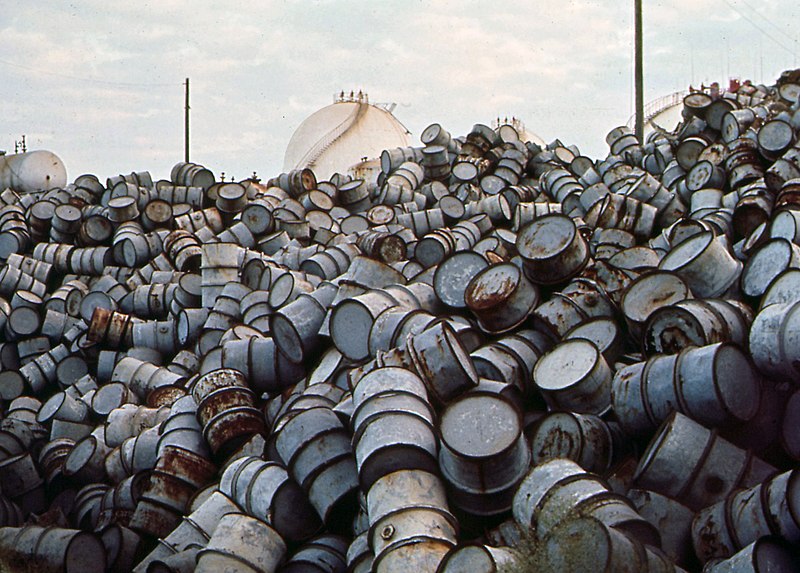 A mound of oil drums near the Baton Rouge ExxonMobil Refinery along the Mississippi River in December 1972.
