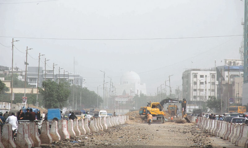 High level of dust particles in the air reduce visibility and envelope the Quaid’s mausoleum.