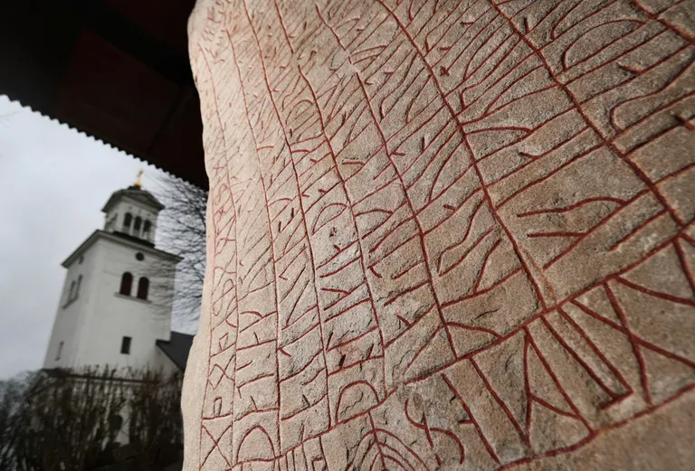 Viking-era runic stone in front of the Rok Church near the Lake Vattern and the town of Odeshog, Sweden,