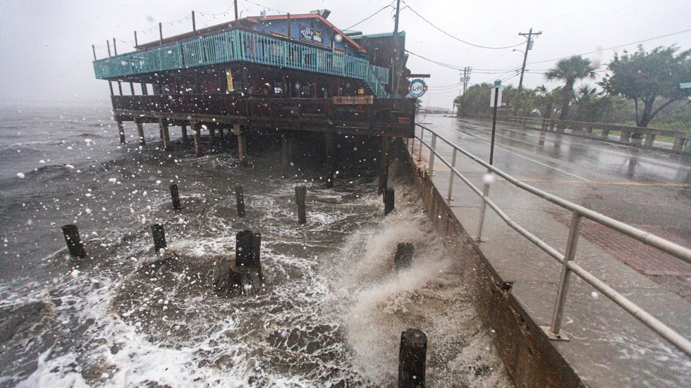 Tropical Storm Elsa creates large waves on July 7, 2021, in Cedar Key, Florida.
