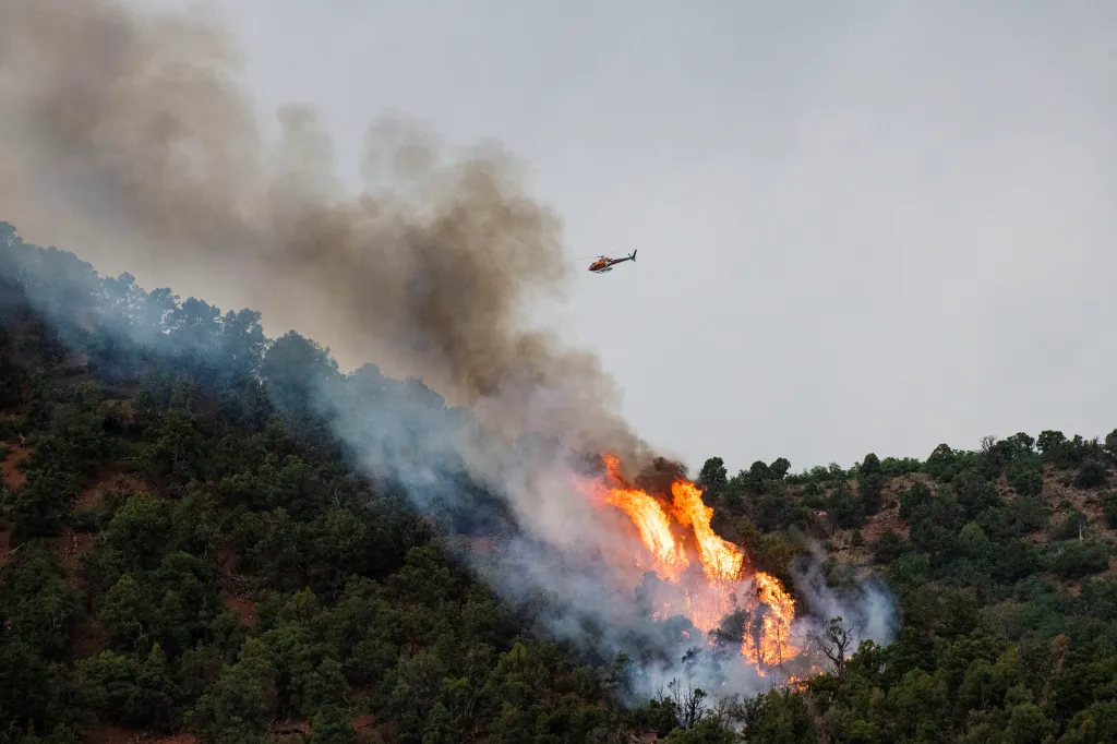 The Pine Gulch fire, seen here from afar, was thought to have been started by a lightning strike.