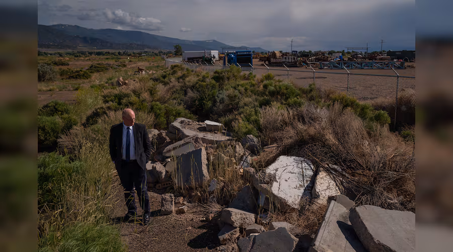 Rob Dotson, the city manager of Enoch, visits what was to be the new Parkview subdivision, where work is now abandoned due to ground fissuring from subsidence, on June 12, 2023.