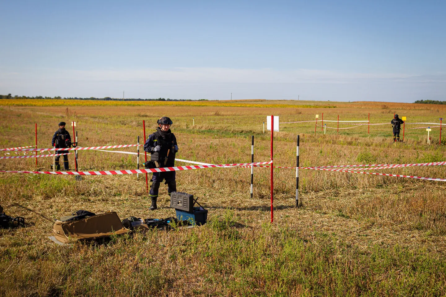 Sappers are seen at work during a press tour to demonstrate the integration of AI into the process of humanitarian demining, in the Zhytomyr Region, northern Ukraine on Sept. 20, 2023