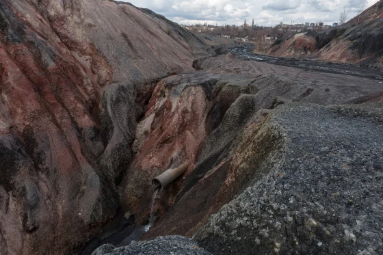 The mines, once the beating heart of the region where giant mountains of metal waste known as slag still dot the landscape, now represent a looming environmental catastrophe.