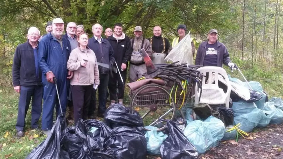 Volunteers collect about 1,000 bin bags of litter from the river each year