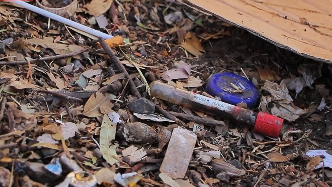 A blood sample tube in waste landfill, Sana’a