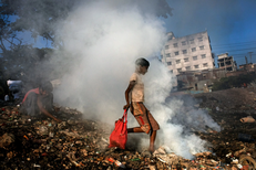 Air pollution in Dhaka from burning garbage.