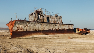 Deserted ship on the show of Aral Sea