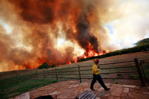 Emergency crews battle a wildfire on April 19, 2011 in Strawn, Texas.