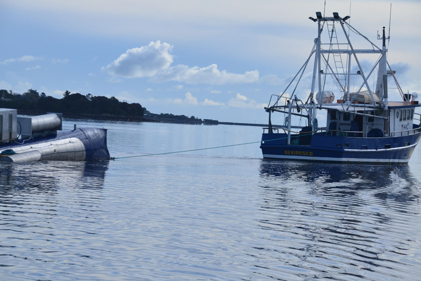 Tidal turbine towed out to sea.