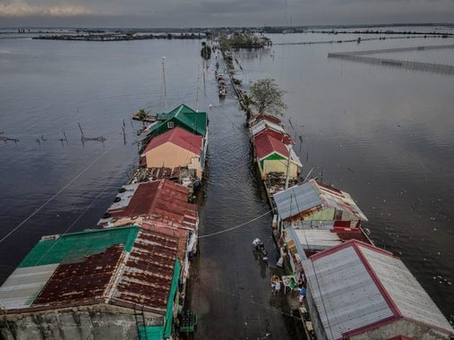 Village in Bulakan is flooded by the high tide. The islands in Manila Bay in Bulacan Province are being inundated by every high tide as the sea advances.
