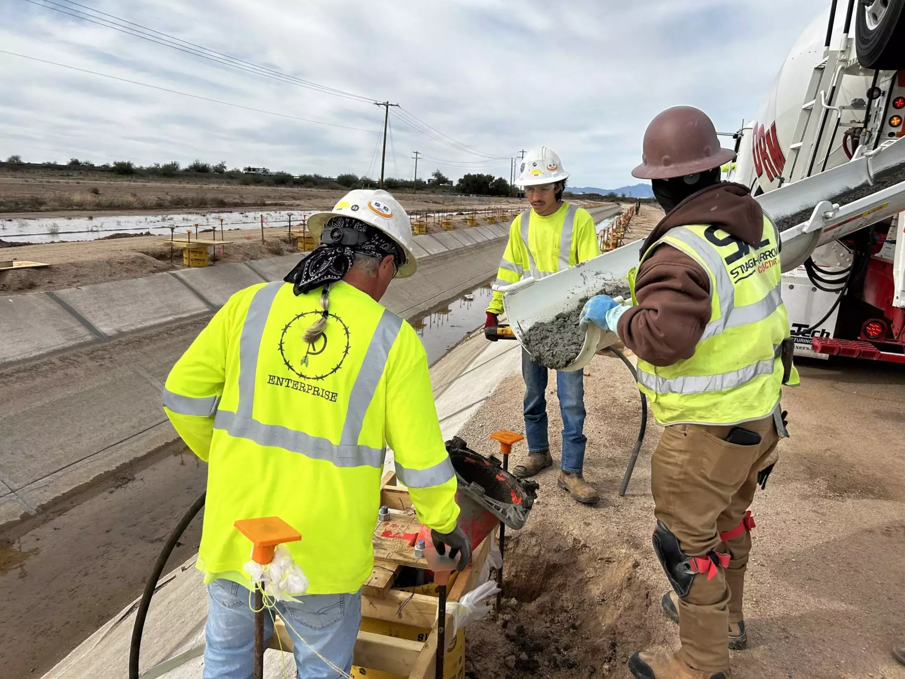 A construction crew at the Casablanca irrigation canal on the Gila River Indian Reservation