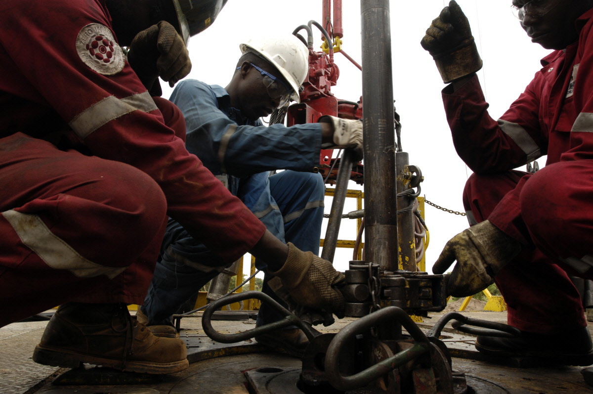 Workers at the Komé oilfield near Doba