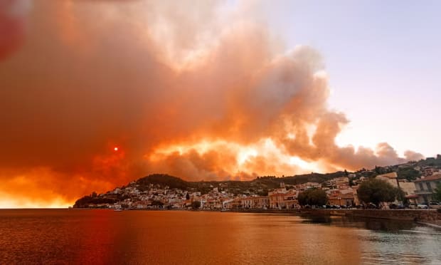 Flames burn on the mountain near Limni village on the island of Evia, on 3 August 2021.