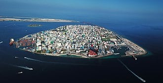 Threatened by rising sea levels, the Maldives is building a floating city